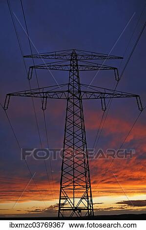 "Electricity pylon against a red evening sky, Bavaria, Germany, Europe" View Large Photo Image Stock Photo - "Electricity pylon against a red evening sky, Bavaria, Germany, Europe". Fotosearch