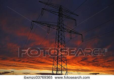 "Electricity pylon against a red evening sky, Bavaria, Germany, Europe" View Large Photo Image Stock Photography - "Electricity pylon against a red evening sky, Bavaria, Germany, Europe". Fotosearch
