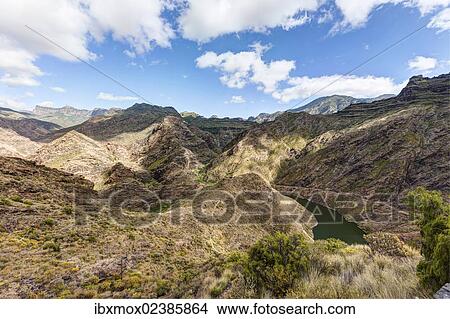 Picture - "Embalse Presa del Parralillo reservoir, or """"green lake"""", in the mountains of Caldera de Tejeda, also called a """"petrified storm"""", Artenara Region, Gran Canaria, Canary Islands, Spain, Europe, PublicGround, Europe". Fotosearch