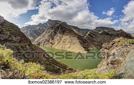 Stock Photo - "Embalse Presa del Parralillo reservoir, also called """"the green lake"""", in the mountains of Caldera de Tejeda, also called a """"petrified storm"""", Artenara Region, Gran Canaria, Canary Islands, Spain, Europe, PublicGround, Europe". Fotosearch