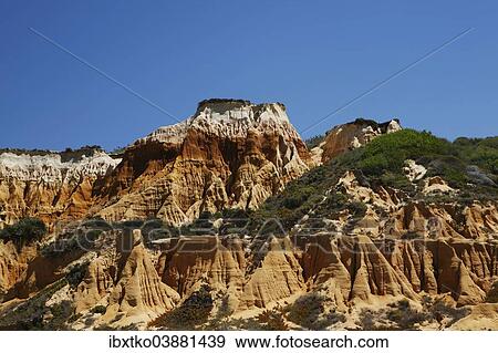 "Eroded sandstone cliffs, Atlantic coast, near Melides, Portugal, Europe" View Large Photo Image Stock Photo - "Eroded sandstone cliffs, Atlantic coast, near Melides, Portugal, Europe". Fotosearch