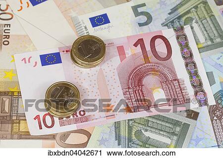Euro banknotes and coins View Large Photo Image Stock Image - Euro banknotes and coins. Fotosearch
