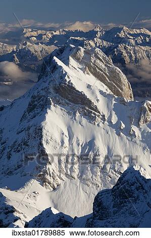 Stock Photography - "Evening in the winter on Saentis Mountain in Appenzellerland, Swiss Alps, Switzerland, Europe". Fotosearch