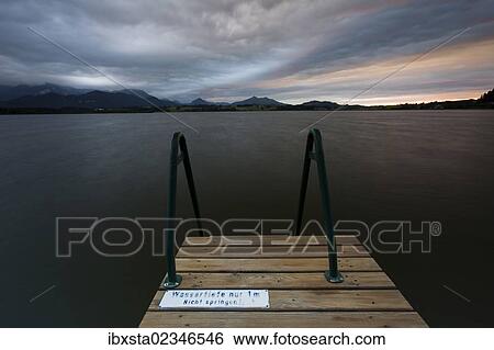 "Evening mood at Lake Hopfensee in Allgaeu, Bavaria, Germany, Europe, PublicGround, Europe" View Large Photo Image Stock Photograph - "Evening mood at Lake Hopfensee in Allgaeu, Bavaria, Germany, Europe, PublicGround, Europe". Fotosearch