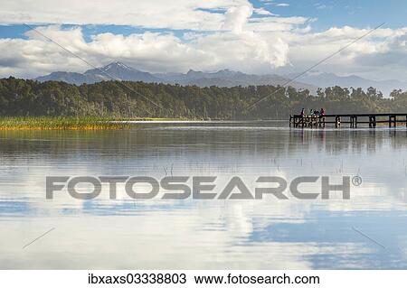 "Evening mood at Lake Mahinapua, Ruatapu, West Coast Region, New Zealand, Oceania" View Large Photo Image Stock Image - "Evening mood at Lake Mahinapua, Ruatapu, West Coast Region, New Zealand, Oceania". Fotosearch