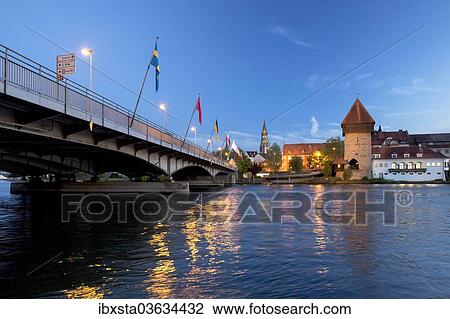 "Evening mood at the old bridge over the Rhine with Konstanz Minster or Konstanz Cathedral at back, Lake Constance, Konstanz, Baden-Wurttemberg, Germany, Europe" View Large Photo Image Stock Image - "Evening mood at the old bridge over the Rhine with Konstanz Minster or Konstanz Cathedral at back, Lake Constance, Konstanz, Baden-Wurttemberg, Germany, Europe". Fotosearch