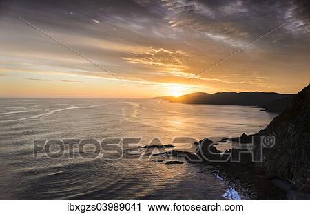 Stock Image - "Evening mood at the Pacific coast, Nugget Point, Catlins, South Island, New Zealand, Oceania". Fotosearch