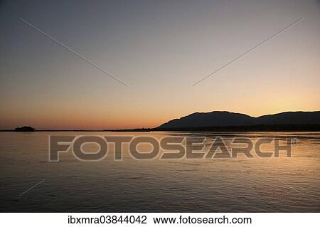 "Evening mood at the Zambezi river, Lower Zambezi, Zambia, Africa" View Large Photo Image Stock Image - "Evening mood at the Zambezi river, Lower Zambezi, Zambia, Africa". Fotosearch