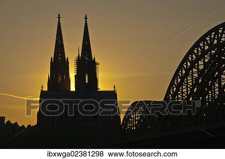 Stock Photo - "Evening mood, Cologne Cathedral and Hohenzollernbrucke bridge, Cologne, North Rhine-Westphalia, Germany, Europe, PublicGround, Europe". Fotosearch