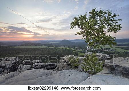 "Evening mood on Mt Gohrisch with sunset, Elbe Sandstone Mountains, Saxony, Germany, Europe" View Large Photo Image Stock Photograph - "Evening mood on Mt Gohrisch with sunset, Elbe Sandstone Mountains, Saxony, Germany, Europe". Fotosearch