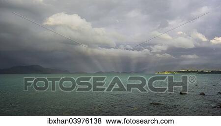 "Evening mood with storm clouds above Lago Puyehue, Puyehue, Los Lagos Region, Chile, South America" View Large Photo Image Stock Photo - "Evening mood with storm clouds above Lago Puyehue, Puyehue, Los Lagos Region, Chile, South America". Fotosearch