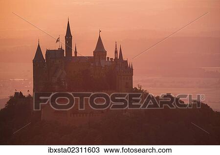 Stock Image - "Evening mood with sunset near Burg Hohenzollern Castle, Swabian Alb, Baden-Wuerttemberg, Germany, Europe, PublicGround, Europe". Fotosearch