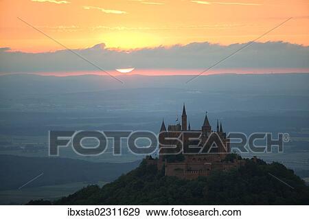 "Evening mood with sunset near Burg Hohenzollern Castle, Swabian Alb, Baden-Wuerttemberg, Germany, Europe, PublicGround, Europe" View Large Photo Image Stock Photo - "Evening mood with sunset near Burg Hohenzollern Castle, Swabian Alb, Baden-Wuerttemberg, Germany, Europe, PublicGround, Europe". Fotosearch