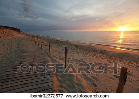 Stock Photo - "Evening on the beach in Arcachon, boardwalk, disabled access to the beach, France, Europe, Atlantic Coast, Europe". Fotosearch