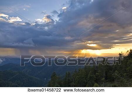 "Evening rain clouds over the Rhine valley, seen from Mt. Schliffkopf, Black Forest, Baden-Wuerttemberg, Germany, Europe" View Large Photo Image Stock Image - "Evening rain clouds over the Rhine valley, seen from Mt. Schliffkopf, Black Forest, Baden-Wuerttemberg, Germany, Europe". Fotosearch