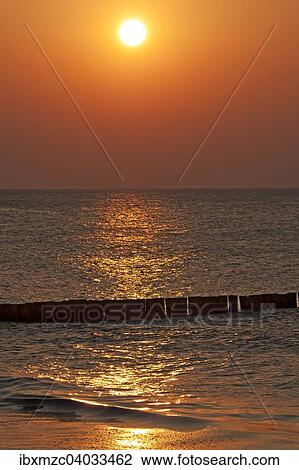 "Evening sun on the Baltic Sea, in front groin, Ahrenshoop, Darss, Mecklenburg-Western Pomerania, Germany, Europe" View Large Photo Image Stock Image - "Evening sun on the Baltic Sea, in front groin, Ahrenshoop, Darss, Mecklenburg-Western Pomerania, Germany, Europe". Fotosearch