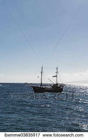 "Excursion boat with a pirate flag, Tenerife, Canary Islands, Spain, Europe" View Large Photo Image Stock Photo - "Excursion boat with a pirate flag, Tenerife, Canary Islands, Spain, Europe". Fotosearch