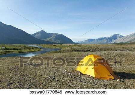 "Expedition tent, arctic tundra, camping, Wind River and Mackenzie Mountains behind, Yukon Territory, Canada, North America" View Large Photo Image Stock Photography - "Expedition tent, arctic tundra, camping, Wind River and Mackenzie Mountains behind, Yukon Territory, Canada, North America". Fotosearch