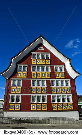Stock Photo - "Facade of a residential building with curved gable, Appenzell style, Appenzell, Canton Appenzell, Switzerland, Europe". Fotosearch