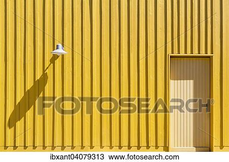"Facade of a yellow beach hut with door and lamp, Ile d? ÇÖOleron, Charente Maritime, Poitou-Charentes, France, Europe" View Large Photo Image Stock Image - "Facade of a yellow beach hut with door and lamp, Ile d? ÇÖOleron, Charente Maritime, Poitou-Charentes, France, Europe". Fotosearch