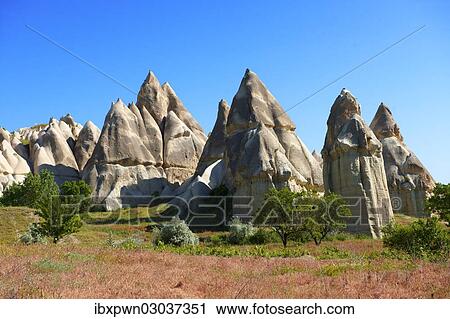 Stock Image - "Fairy Chimney rock formations, Love Valley, Goreme National Park, Cappadocia, Nevsehir Province, Central Anatolia Region, Turkey, Asia". Fotosearch