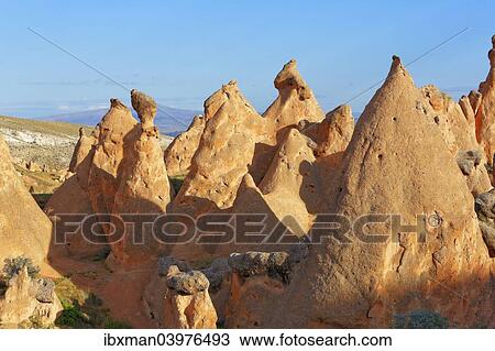 "Fairy chimneys in Devrent Valley, Goreme National Park, Nevsehir Province, Cappadocia, Central Anatolia Region, Anatolia, Turkey, Asia" View Large Photo Image Stock Image - "Fairy chimneys in Devrent Valley, Goreme National Park, Nevsehir Province, Cappadocia, Central Anatolia Region, Anatolia, Turkey, Asia". Fotosearch