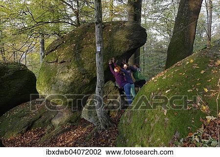 "Family hiking in a rock park, rocks, rock garden, concentric weathering, castle grounds, Falkenstein, Upper Palatinate, Bavaria, Germany, Europe" View Large Photo Image Stock Image - "Family hiking in a rock park, rocks, rock garden, concentric weathering, castle grounds, Falkenstein, Upper Palatinate, Bavaria, Germany, Europe". Fotosearch