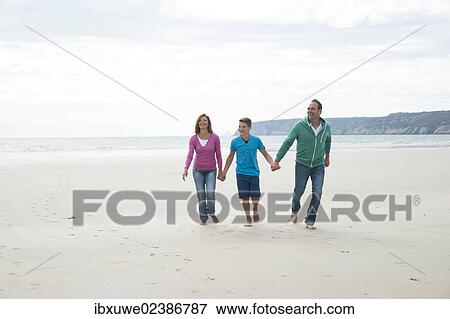 Family on a beach View Large Photo Image Stock Photo - Family on a beach. Fotosearch