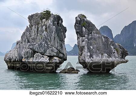 Stock Image - "Famous rock formations, Halong Bay, Vietnam, South East Asia, Asia". Fotosearch