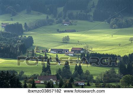 Stock Image - "Farm surrounded by pastures, Weitnau, Oberallgau, Bavaria, Germany, Europe". Fotosearch