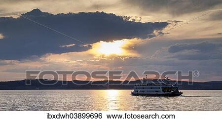 "Ferry in the evening light, Lake Constance, Meersburg, Baden-Wurttemberg, Germany, Europe" View Large Photo Image Stock Photograph - "Ferry in the evening light, Lake Constance, Meersburg, Baden-Wurttemberg, Germany, Europe". Fotosearch