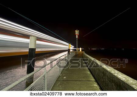 "Ferry port in Konstanz Staad light traces of a moving ferry, Lake Constance, Baden-Wuerttemberg, Germany, Europe, PublicGround, Europe" View Large Photo Image Stock Photo - "Ferry port in Konstanz Staad light traces of a moving ferry, Lake Constance, Baden-Wuerttemberg, Germany, Europe, PublicGround, Europe". Fotosearch