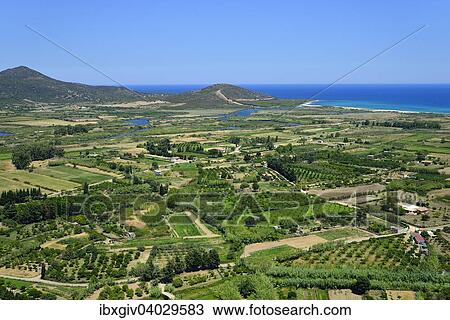 "Fertile plain around the delta of the river Fiume di Posada, Posada, Province of Nuoro, Sardinia, Italy, Europe" View Large Photo Image Stock Image - "Fertile plain around the delta of the river Fiume di Posada, Posada, Province of Nuoro, Sardinia, Italy, Europe". Fotosearch