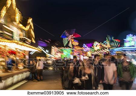 "Festival visitors and rides at night, Munich Spring Festival, Theresienwiese, Munich, Bavaria, Germany, Europe" View Large Photo Image Stock Photography - "Festival visitors and rides at night, Munich Spring Festival, Theresienwiese, Munich, Bavaria, Germany, Europe". Fotosearch