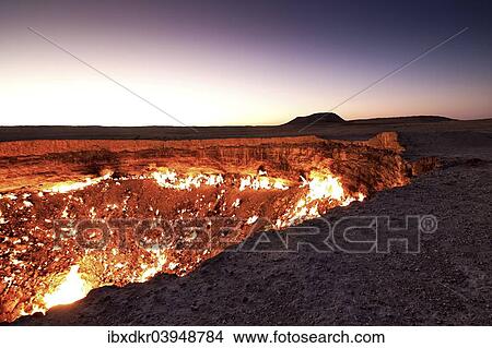 "Fire crater, gas crater, """"Door to Hell"""" Darvaza crater, Derweze or Darvaza, Karakum Desert, Dasoguz Province, Turkmenistan, Asia" View Large Photo Image Picture - "Fire crater, gas crater, """"Door to Hell"""" Darvaza crater, Derweze or Darvaza, Karakum Desert, Dasoguz Province, Turkmenistan, Asia". Fotosearch
