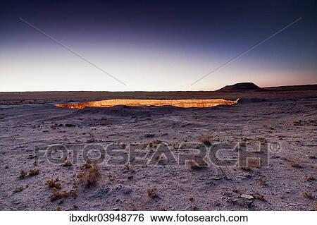 Stock Photograph - "Fire crater, gas crater, """"Door to Hell"""" Darvaza crater, Derweze or Darvaza, Karakum Desert, Dasoguz Province, Turkmenistan, Asia". Fotosearch