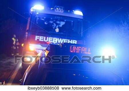 "Fire engine and police car with flashing blue lights and the LED display """"Unfall"""", German for """"accident"""", at a crash site, Weil im Schonbuch, Baden-Wurttemberg, Germany, Europe" View Large Photo Image Stock Photo - "Fire engine and police car with flashing blue lights and the LED display """"Unfall"""", German for """"accident"""", at a crash site, Weil im Schonbuch, Baden-Wurttemberg, Germany, Europe". Fotosearch