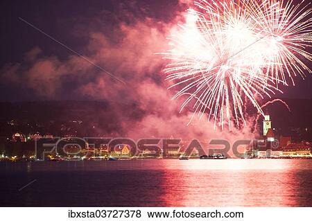"Fireworks at the promenade festival in Ueberlingen, Lake Constance, Lake Constance, Uberlingen, Bodenseekreis, Baden-Wurttemberg, Germany, Europe" View Large Photo Image Stock Photo - "Fireworks at the promenade festival in Ueberlingen, Lake Constance, Lake Constance, Uberlingen, Bodenseekreis, Baden-Wurttemberg, Germany, Europe". Fotosearch
