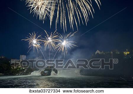 "Fireworks at the Rhine Falls during the Swiss National Day celebrations, Schaffhausen, Canton of Schaffhausen, Switzerland, Europe" View Large Photo Image Picture - "Fireworks at the Rhine Falls during the Swiss National Day celebrations, Schaffhausen, Canton of Schaffhausen, Switzerland, Europe". Fotosearch