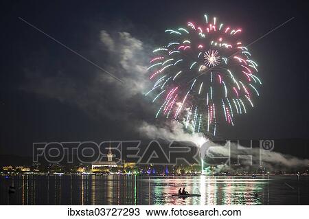 "Fireworks during the Hausherrenfest festival, couple on a floating island in Lake Constance at the front, Radolfzell, Baden-Wurttemberg, Germany, Europe" View Large Photo Image Stock Image - "Fireworks during the Hausherrenfest festival, couple on a floating island in Lake Constance at the front, Radolfzell, Baden-Wurttemberg, Germany, Europe". Fotosearch