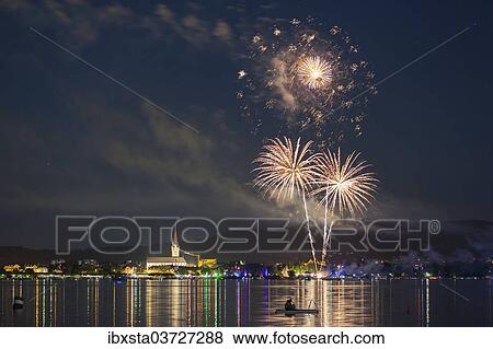 "Fireworks during the Hausherrenfest festival, couple on a floating island in Lake Constance at the front, Radolfzell, Baden-Wurttemberg, Germany, Europe" View Large Photo Image Stock Photo - "Fireworks during the Hausherrenfest festival, couple on a floating island in Lake Constance at the front, Radolfzell, Baden-Wurttemberg, Germany, Europe". Fotosearch