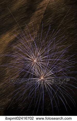 Stock Image - "Fireworks in the night sky, Quebec, Canada, North America". Fotosearch