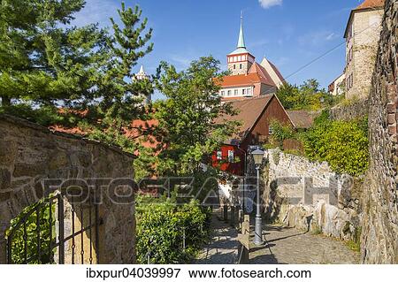 "Fischerpforte gate with the tower of the Old Waterworks and St. Michael's Church, Bautzen, Saxony, Germany, Europe" View Large Photo Image Stock Photo - "Fischerpforte gate with the tower of the Old Waterworks and St. Michael's Church, Bautzen, Saxony, Germany, Europe". Fotosearch
