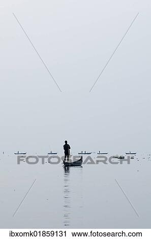 "Fisherman on Lake Vembanad, Kerala, South India, India, Asia" View Large Photo Image Stock Image - "Fisherman on Lake Vembanad, Kerala, South India, India, Asia". Fotosearch