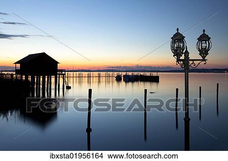 "Fisherman's hut with a lantern on Lake Constance near Altnau, Switzerland, Europe" View Large Photo Image Picture - "Fisherman's hut with a lantern on Lake Constance near Altnau, Switzerland, Europe". Fotosearch