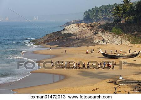"Fishermen pulling in a net, beach south of Kovalam, Vizhinjam in the distance, Malabar Coast, Malabar, Kerala, southern India, India, Asia" View Large Photo Image Stock Image - "Fishermen pulling in a net, beach south of Kovalam, Vizhinjam in the distance, Malabar Coast, Malabar, Kerala, southern India, India, Asia". Fotosearch