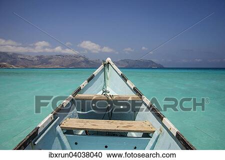 "Fishing boat in the turquoise waters in Shuab Bay, island of Socotra, Yemen, Asia" View Large Photo Image Stock Image - "Fishing boat in the turquoise waters in Shuab Bay, island of Socotra, Yemen, Asia". Fotosearch