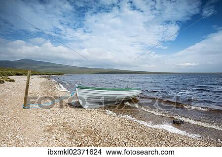 "Fishing boat on the shore of Loch Loyal, Sutherland, Scotland, Great Britain, Europe" View Large Photo Image Picture - "Fishing boat on the shore of Loch Loyal, Sutherland, Scotland, Great Britain, Europe". Fotosearch