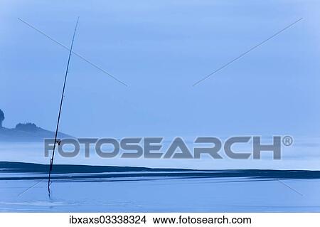 "Fishing rod on the beach at dusk, Oakura, Taranaki Region, New Zealand, Oceania" View Large Photo Image Picture - "Fishing rod on the beach at dusk, Oakura, Taranaki Region, New Zealand, Oceania". Fotosearch