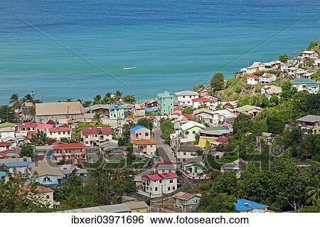 Stock Photograph - "Fishing village on the coast, Canaries, Saint Lucia, North America". Fotosearch